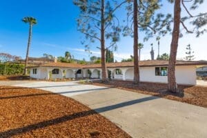 Front exterior Spanish ranch style home — whole home remodel Poway San Diego | Enjoy Build