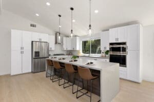 Modern ADU construction in San Diego with a stylish backyard. Custom-built accessory dwelling unit (ADU) with energy-efficient design. San Diego ADU builders working on a detached guest house. Luxury home remodeling project in San Diego featuring a modern kitchen. San Diego home renovation with upgraded interiors and open floor plan. Bathroom remodel in San Diego with sleek tile and custom vanity. New home construction project in San Diego with contemporary design. Experienced San Diego construction team building a custom home. High-quality residential construction site in San Diego.